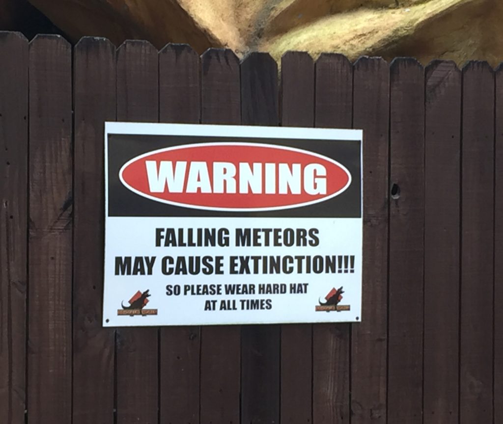 Warning falling meteors may cause extintion sign