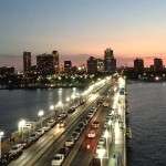 St. Petersburg Road with many car headlights in the twilight from above