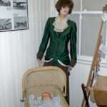 Disheveled mannequin mother with baby