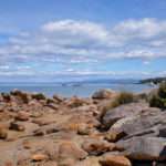 Boats and rocky beach